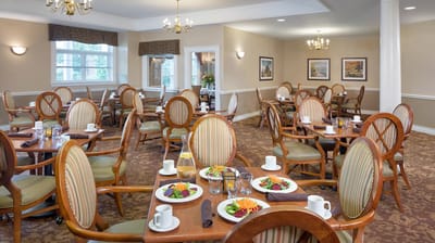 Dining room with neatly arranged tables and meals