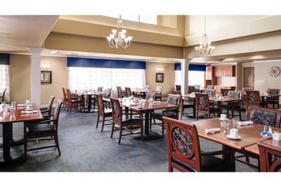 Dining area with tables set up and ready for meals