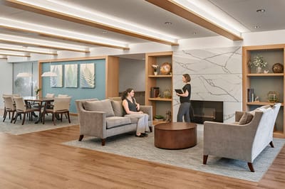 Residents chatting in a modern common area