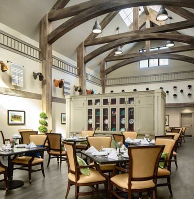 Elegantly arranged dining room with wooden beams