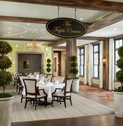 Elegant dining room setup with tables and decor