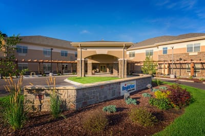 Exterior view of BrightStar Senior Living facility entrance