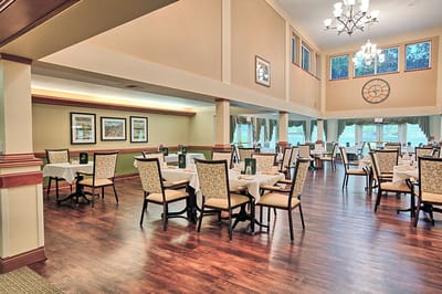 Bright and welcoming dining area with tables set up