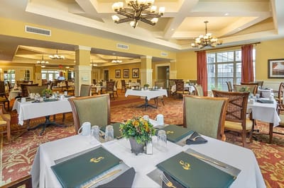 Elegant dining area with well-set tables and decor