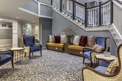 Common area with comfortable seating and decorative accents