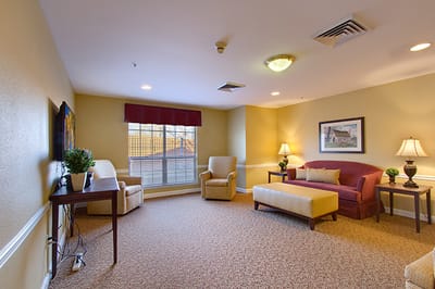 Bright common area with seating and natural light