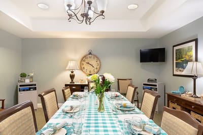 Dining room set up for a meal with elegant decor