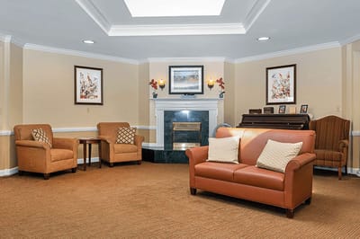 Cozy common area with seating and piano