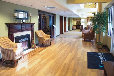 Interior view of a cozy common area with seating