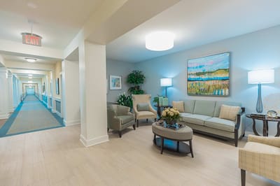 Bright common area with seating and artwork