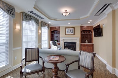 Cozy common area with comfortable seating and a fireplace