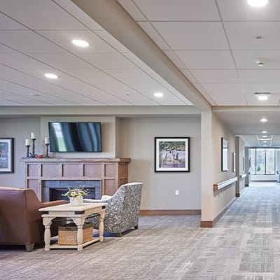 Bright common area with seating and artwork