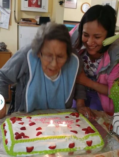 Celebrating a resident's birthday with a cake