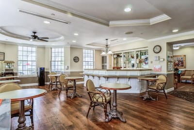 Interior view of a common area with tables and chairs