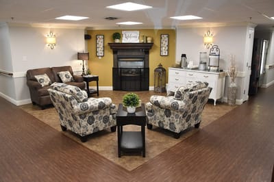 Cozy common area with seating and fireplace