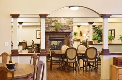 Interior view of a common area with seating and plants