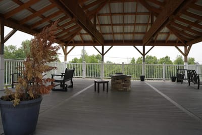 Outdoor covered seating area with a fire pit