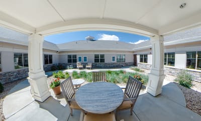 Outdoor courtyard with seating and landscaping