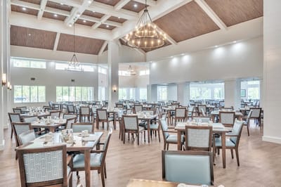 Dining room with tables set for residents