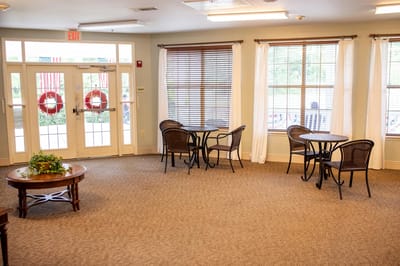 Common area with seating and large windows