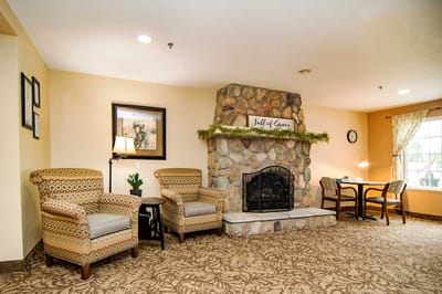 Cozy common area with a fireplace and seating