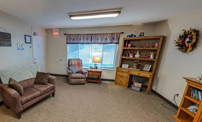 Bright common area with comfortable seating and decor