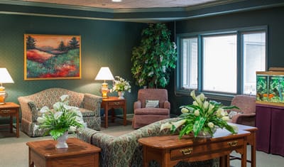 Bright common area with seating and decor
