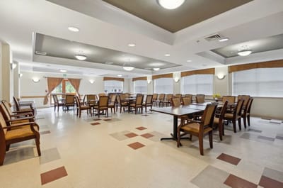 Bright dining room with tables and chairs