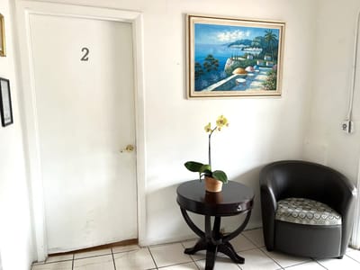 Interior view of a resident room hallway with decor