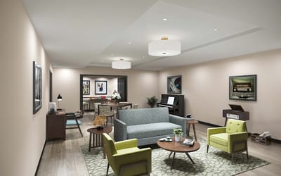 Bright common area with seating and decor