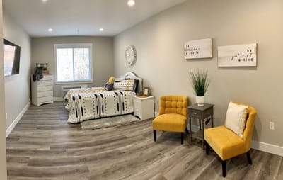 Well-furnished resident room with decorative elements