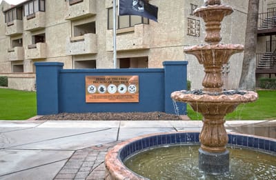 Outdoor fountain and building exterior of the facility