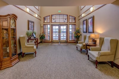 Bright interior common area with seating and decor