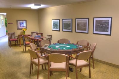 Card game setup in a cozy common area
