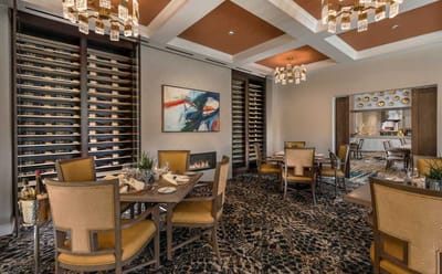 Elegant dining room with wine display and tables