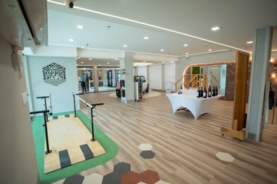 Interior view of a facility lobby with residents and amenities