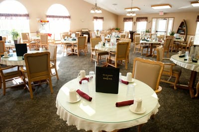 Dining area with set tables ready for meals