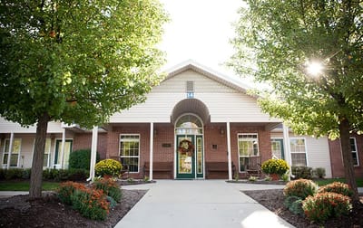 Exterior view of the facility entrance with landscaping