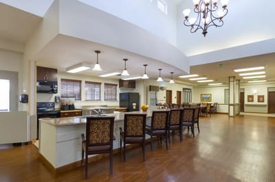 Bright dining room with wooden flooring and seating
