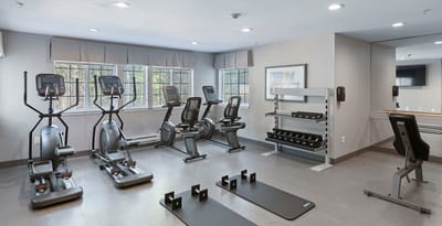 Fitness area with exercise equipment and weights