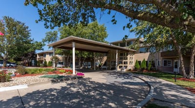 Exterior view of the facility entrance with landscaping