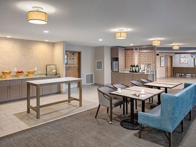 Welcoming common area with seating and refreshments
