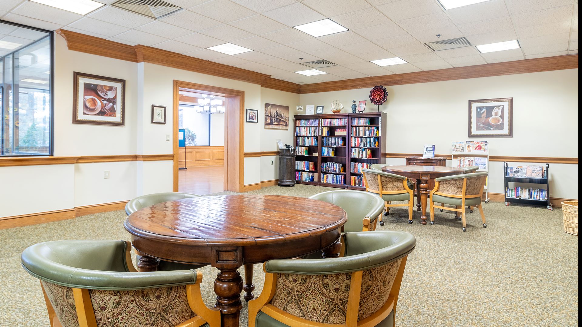 Common area with bookshelves and seating
