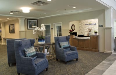 Bright lobby area with comfortable seating and reception desk