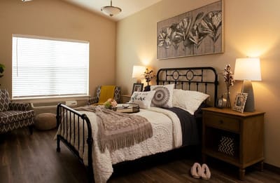 Cozy resident room with bed and decor