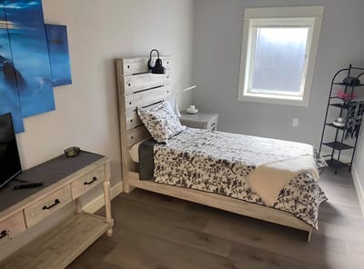 Private resident room with a bed and decor