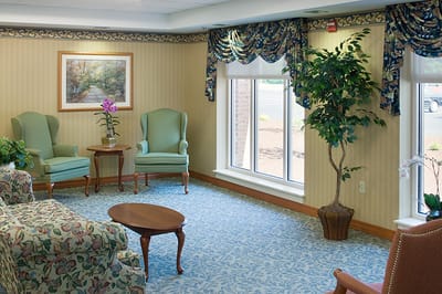Cozy common area with seating and decorative plants