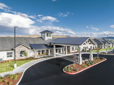 Entrance of Kiley Ranch senior living facility with landscaped driveway