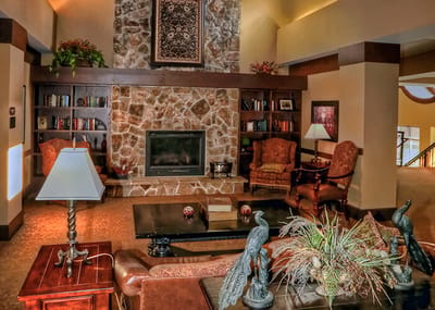 Cozy common area with comfortable seating and a fireplace