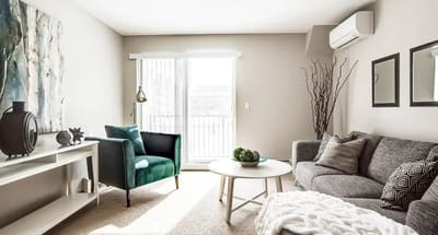 Brightly lit lounge area with modern furniture
